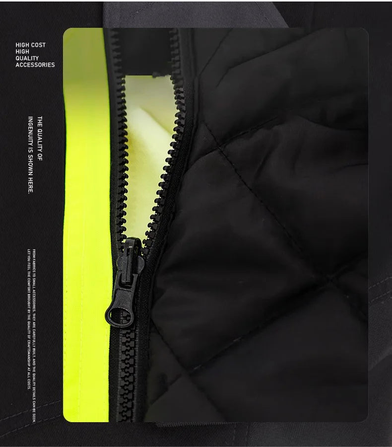 Close-up of a black, quilted waterproof jacket with a high-visibility yellow trim and heavy-duty front zip.