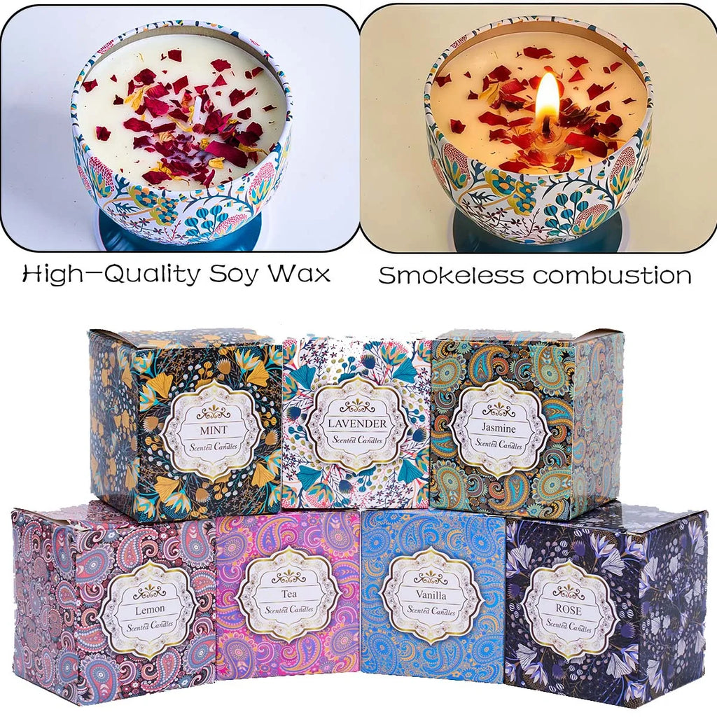 Set of seven scented soy wax candles in decorative floral patterned tins with matching gift boxes.
