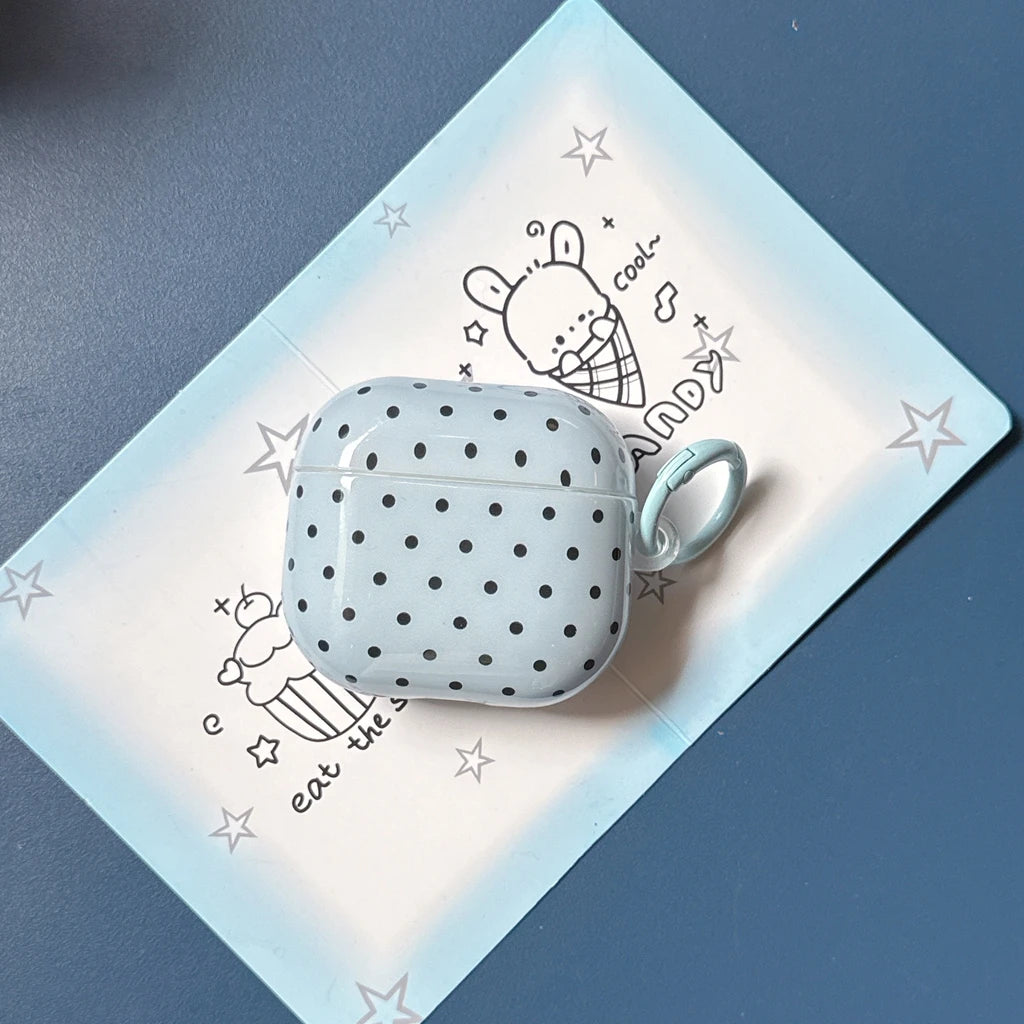 Light blue polka dot silicone AirPods case with a matching side loop, suitable for AirPods 3.