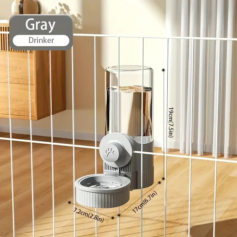 Gray pet water dispenser with a clear cylindrical bottle and a paw-print knob, attached to a wire cage.
