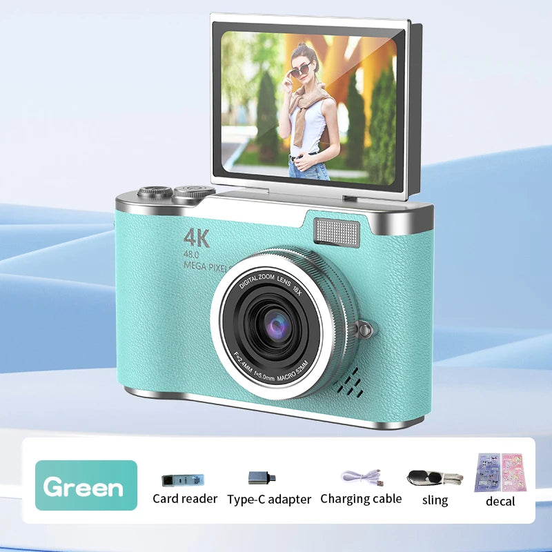 Mint green 4K digital camera with a flip-up screen, textured finish, and included accessories.
