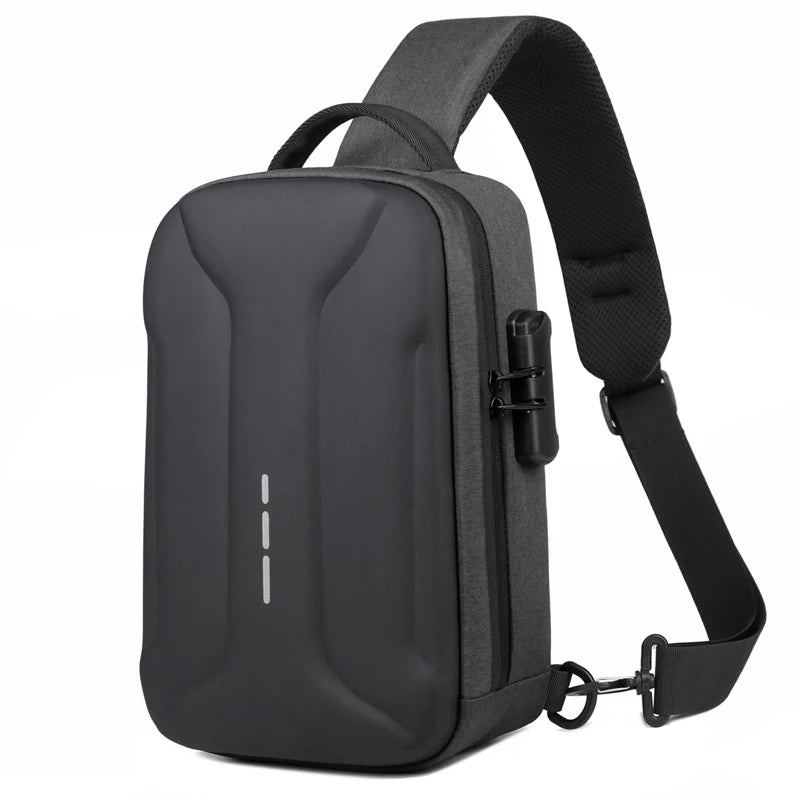 Black anti-theft crossbody bag with a moulded hardshell front, integrated combination lock, and adjustable strap.