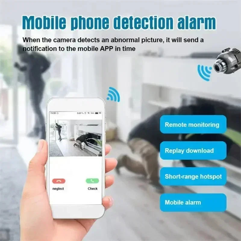 Black plastic mini security camera with remote monitoring, motion detection, and mobile phone app notifications.