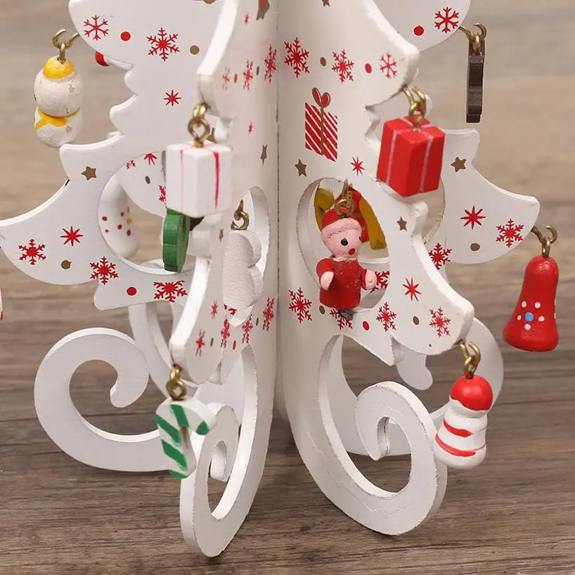 Decorative white wooden Christmas tree ornament with red snowflake patterns and dangling festive charms.