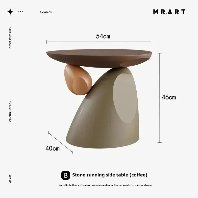 Minimalist coffee-coloured side table featuring a smooth round top on a unique, sculptural organic stone-style base.