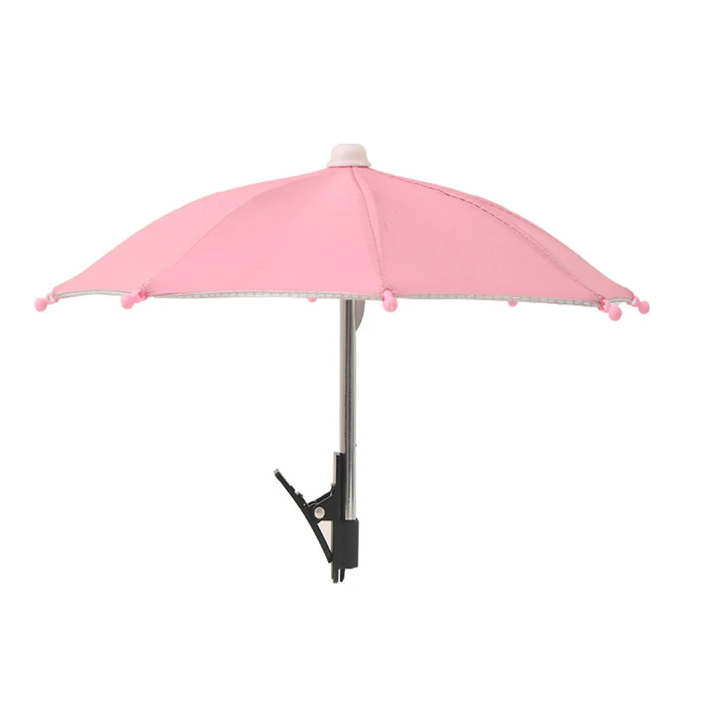 Small pink clip-on parasol with a sturdy metal stand, perfect for hands-free sun protection.