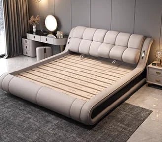 Modern light grey genuine leather bed frame with a curved, tufted headboard and low-profile design.