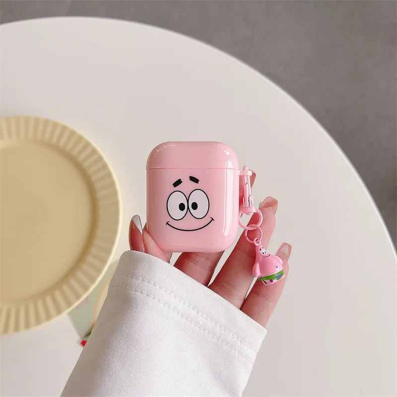 Pink glossy AirPods case featuring Patrick Star face and matching charm, for Apple AirPods 1/2.