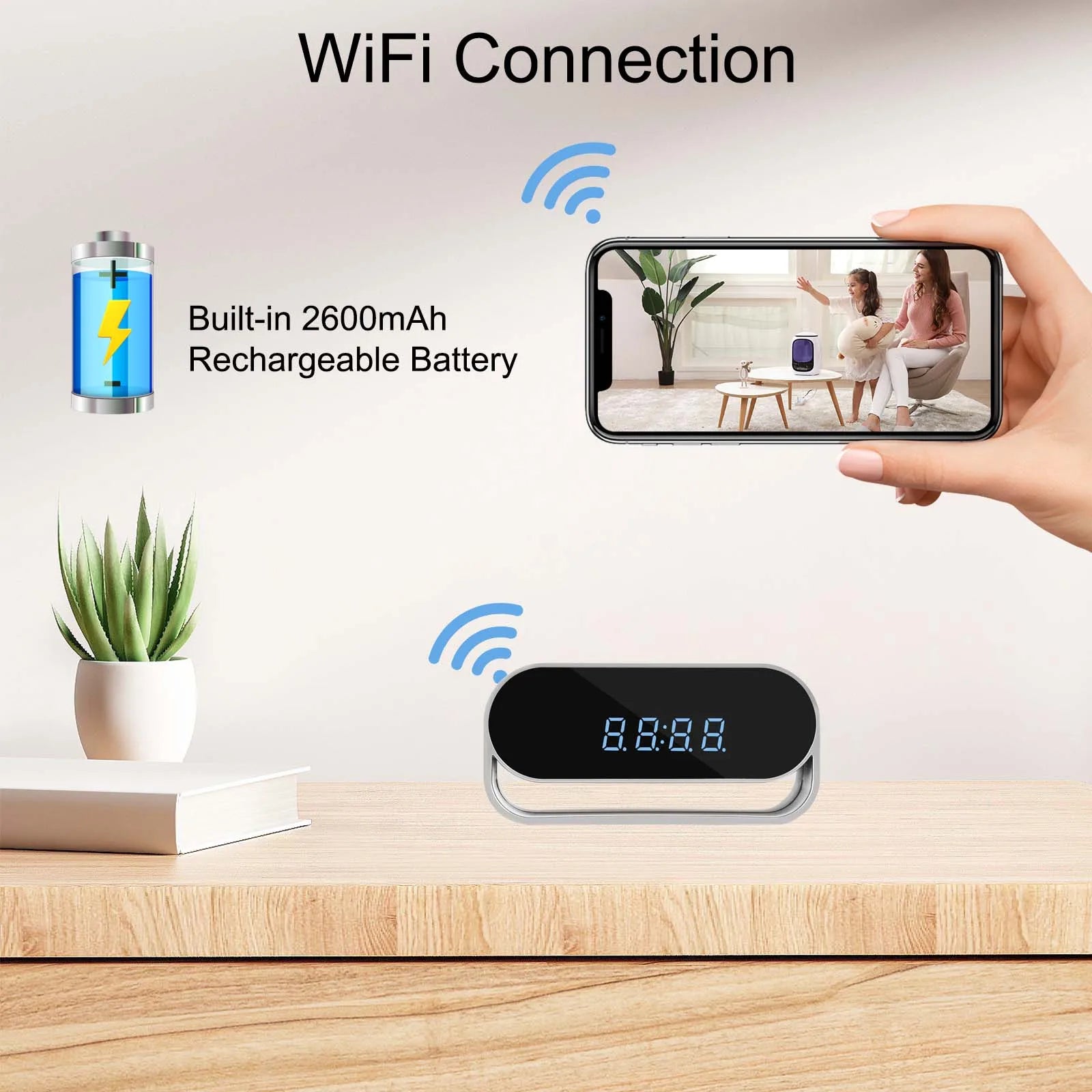 Black and silver digital clock camera with WiFi connectivity and a built-in 2600mAh rechargeable battery on a desk.