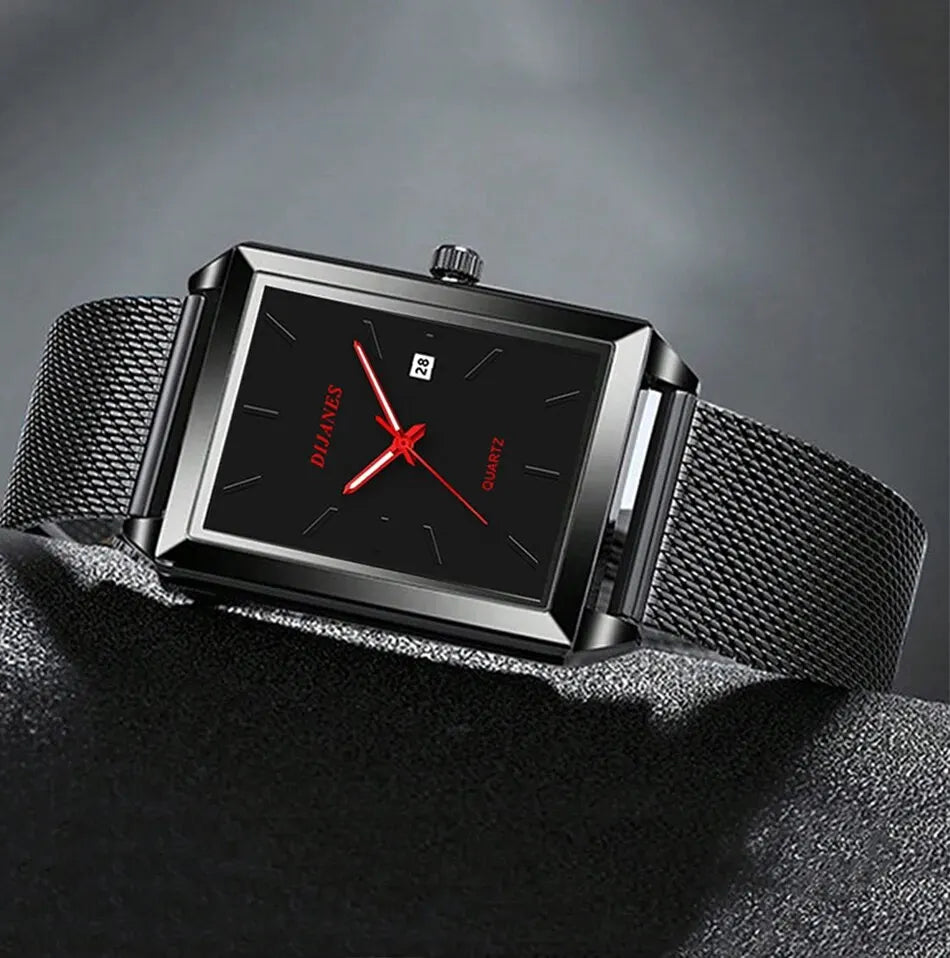 Men’s square quartz watch with a black face, red hands, date display, and a black mesh stainless steel strap.