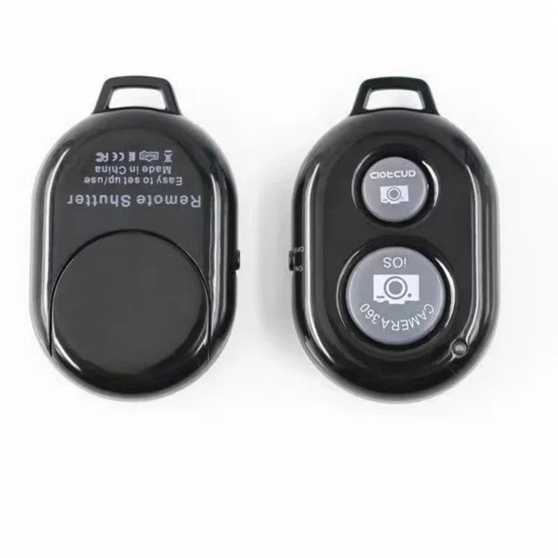 Two black plastic Bluetooth remote shutter buttons for iOS and Android smartphones, shown from front and back.