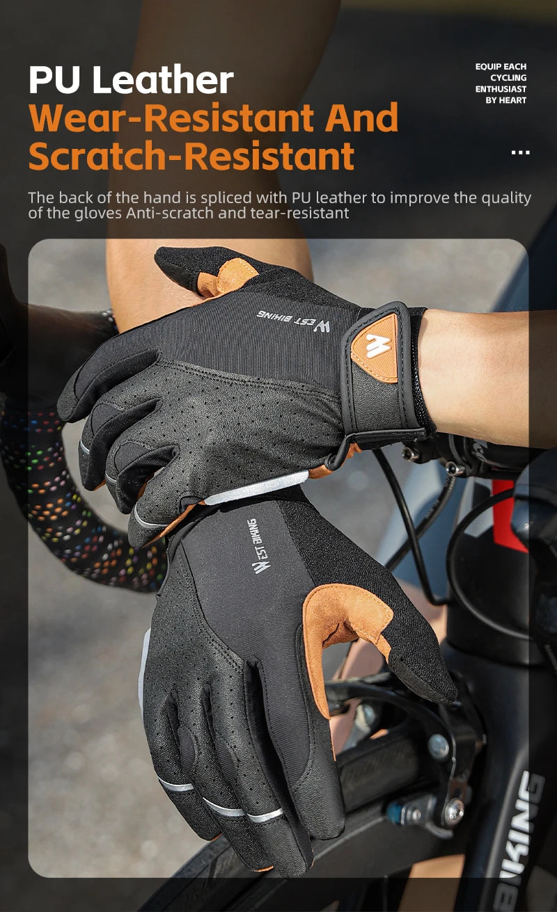 Black and tan cycling gloves with PU leather accents and branding, worn by a cyclist on a bike.