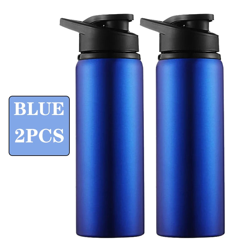 Two blue metallic water bottles with black flip-top lids, side-by-side.