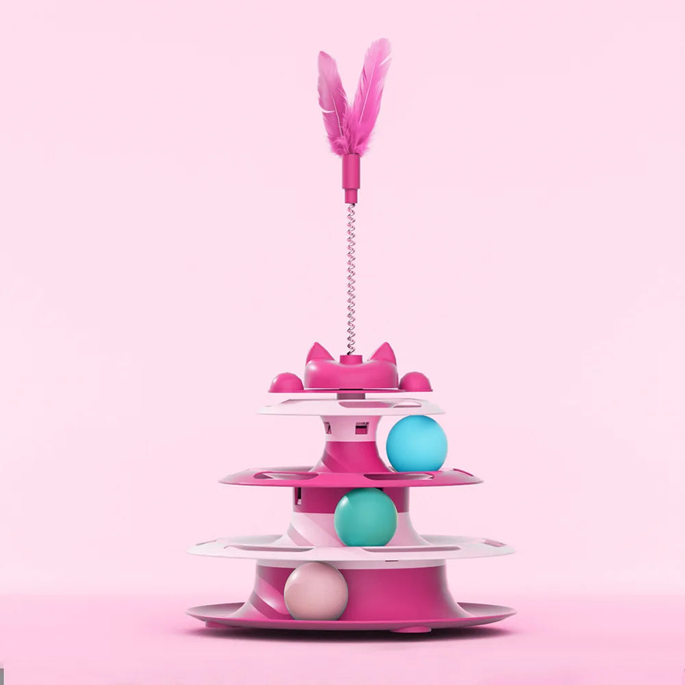 Pink three-tier interactive cat turntable toy with colourful balls and a feather teaser wand on a spring.