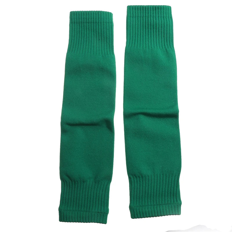 Pair of plain, bright green, footless over-the-calf football socks with ribbed cuffs.