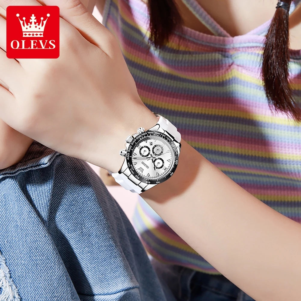 OLEVS women's quartz watch with a white silicone strap, round silver case, and white chronograph dial.