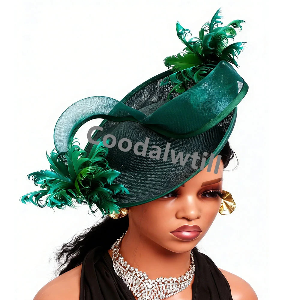 Elegant dark emerald green fascinator headpiece featuring structured mesh fabric and decorative feathered accents.