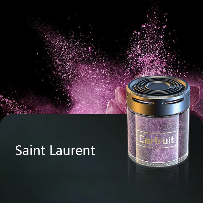 Purple shimmering car air freshener in a sleek, cylindrical glass container with a black metallic vented lid.