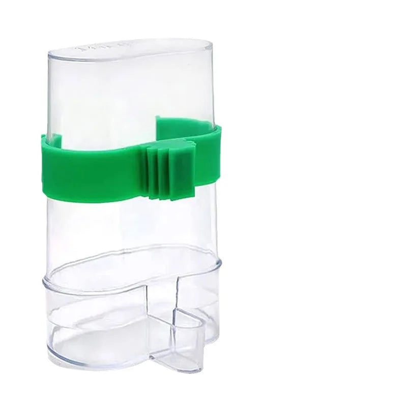Clear plastic bird feeder cup with a bright green adjustable mounting bracket, isolated on a white background.