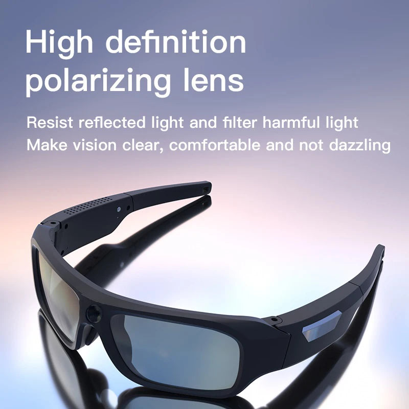 Black plastic smart sunglasses with a camera lens in the center of the frame and polarized lenses.