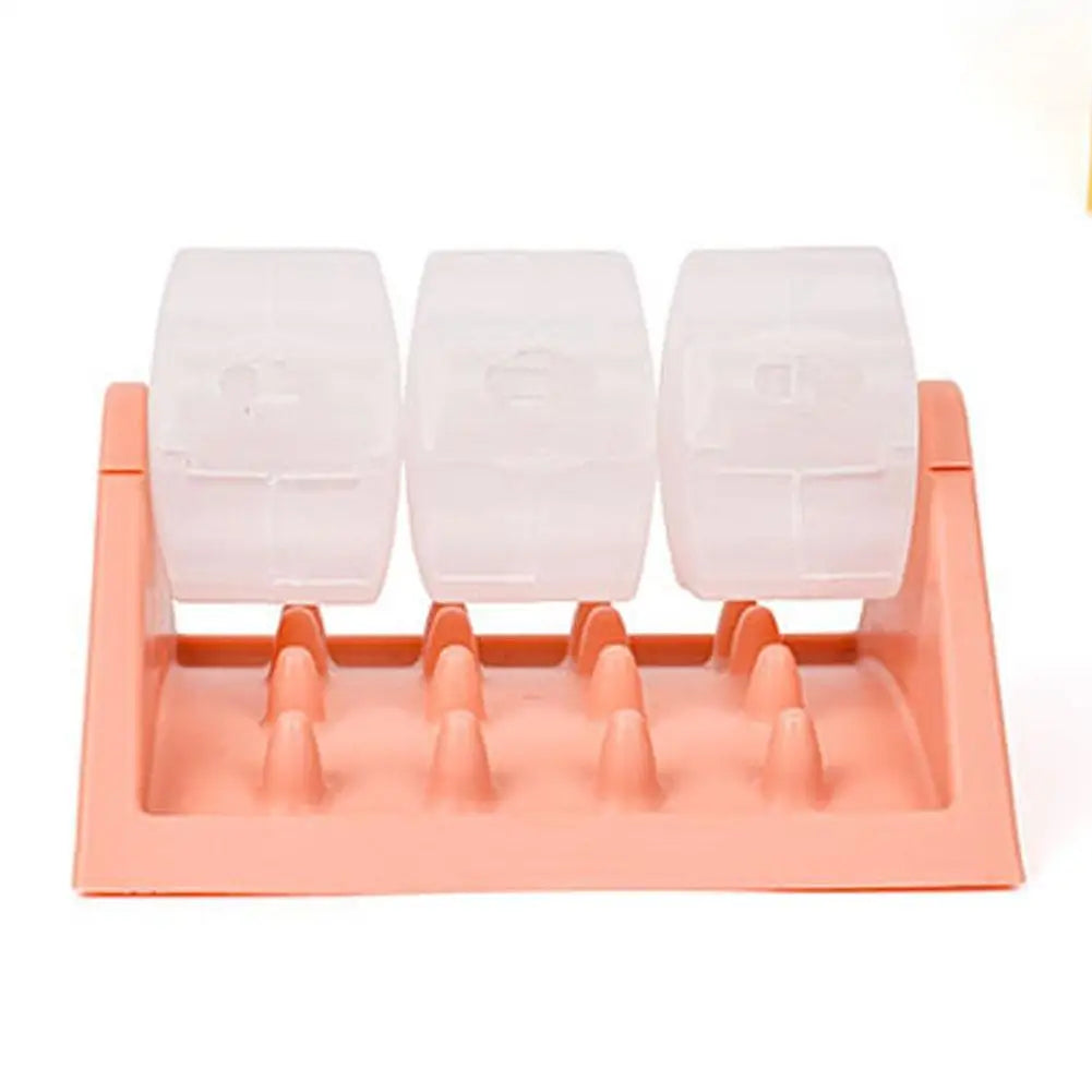 Peach-coloured interactive dog puzzle feeder with three clear, rotating treat compartments and a textured slow-feed base.