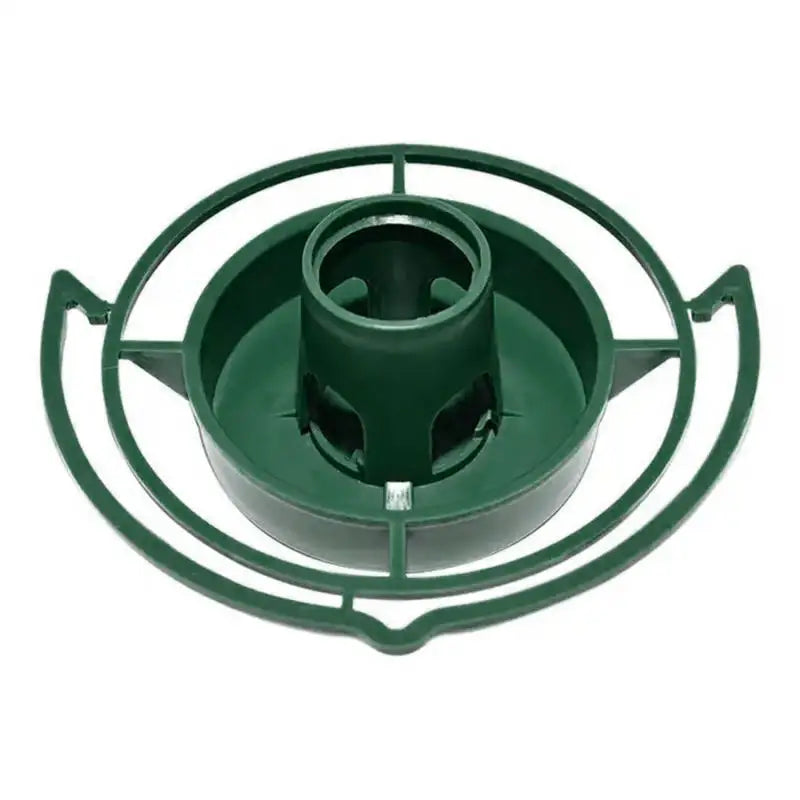 Green plastic Christmas tree stand with a circular, open-frame design and a central trunk holder.