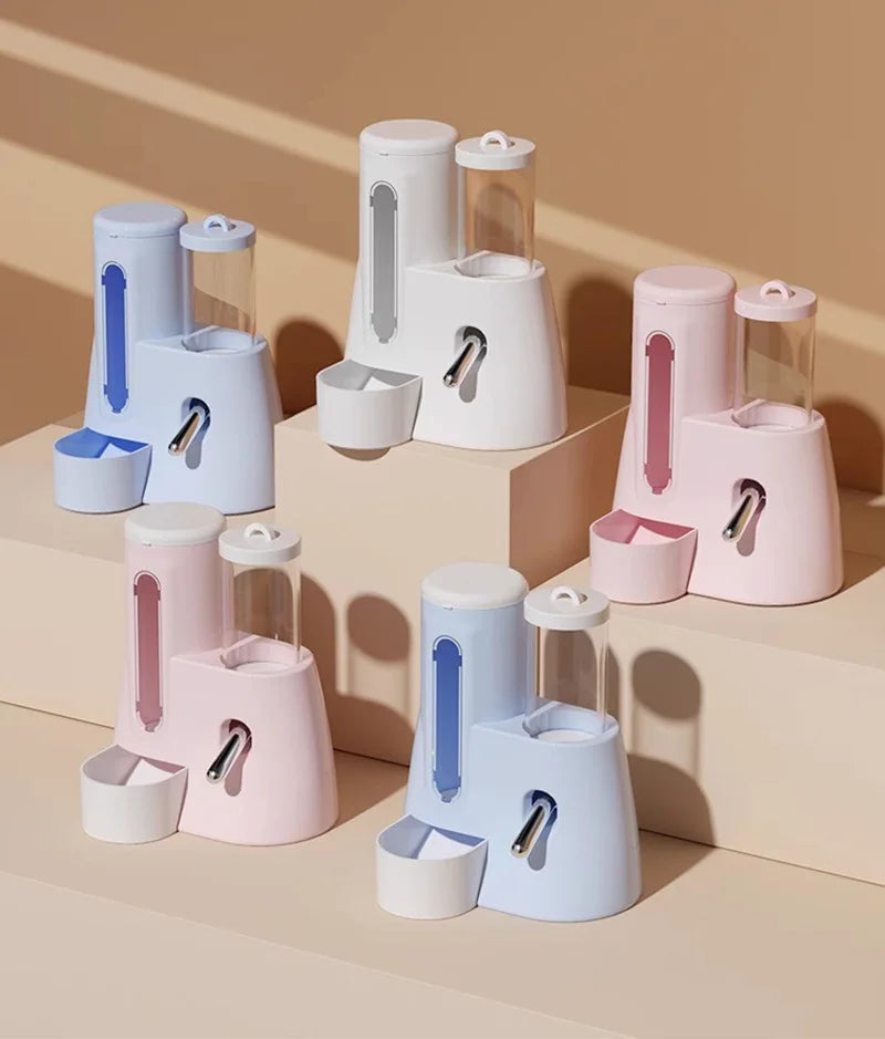 Multiple pastel pet water dispensers in blue, white, and pink with a modern, minimalist design and transparent tanks.