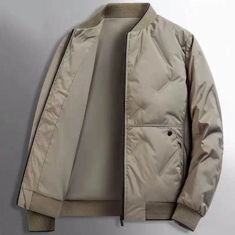 Men’s taupe quilted bomber jacket with a zip-up front, ribbed collar and cuffs, and smooth interior lining.
