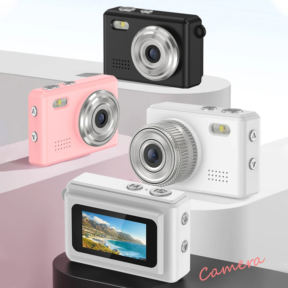 Black, pink, and white digital cameras with silver lenses, flashes, and back LCD screens on display stands.
