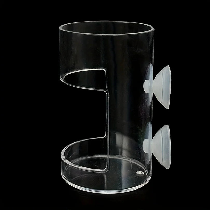 Clear cylindrical wall-mounted holder with two suction cups on a black background.