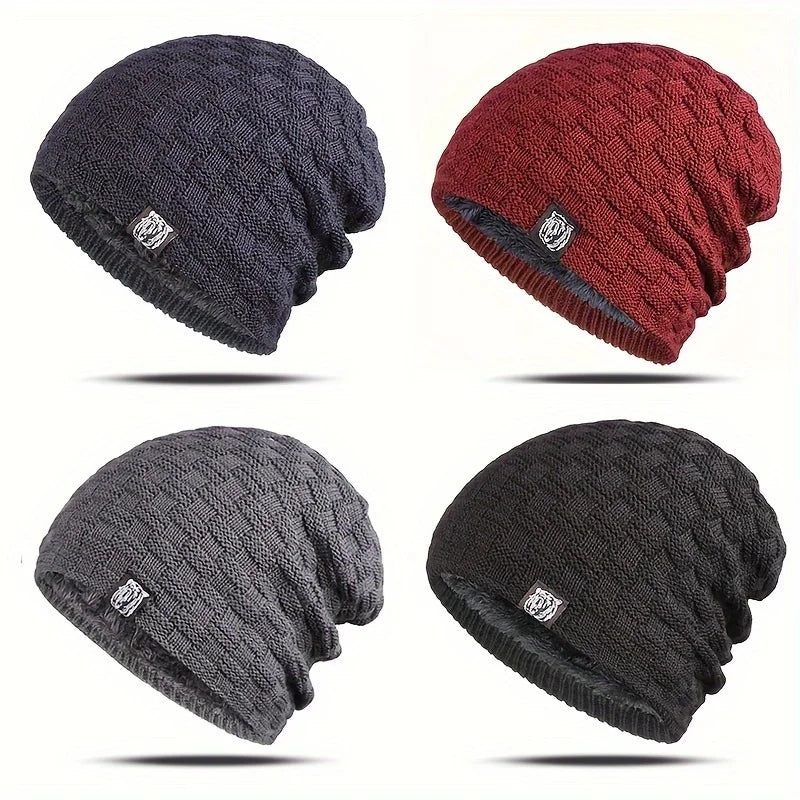 Four men's thermal knitted beanie hats in navy, red, grey, and black, featuring a textured weave and fleece lining.