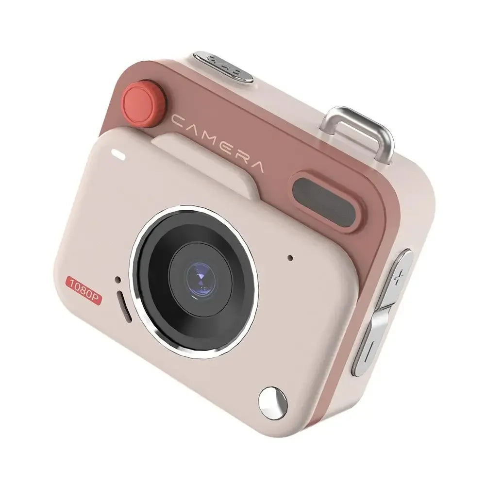 Beige and pink plastic digital camera with a 1080p lens, red shutter button, and silver metal accents.