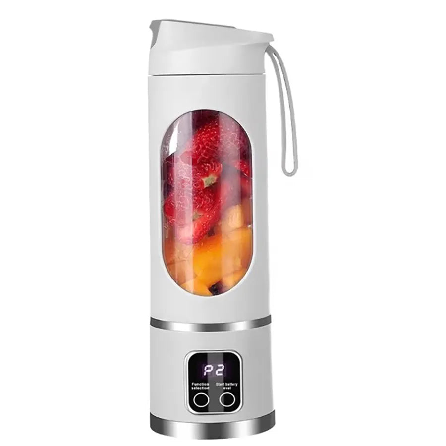 Portable white electric blender with a clear window showing fruit, a digital display, and a carry strap.