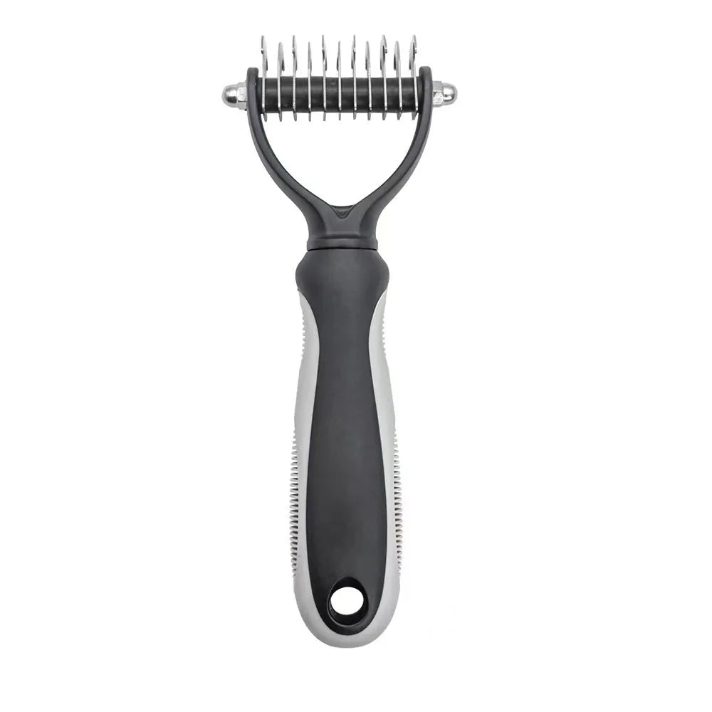 Black and grey pet grooming rake with stainless steel teeth for detangling and removing loose undercoat.