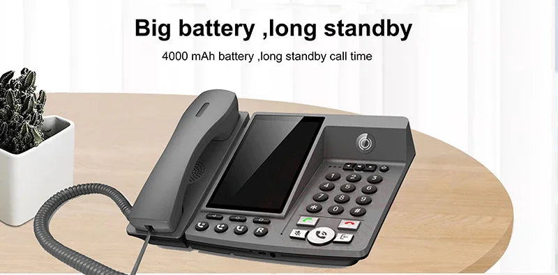 Grey desk phone with a large display screen, 4000mAh battery for long standby, and a coiled handset cord.