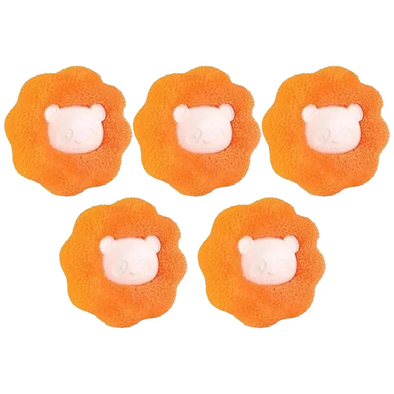 Five flower-shaped orange sponges with a light pink bear face in the centre.