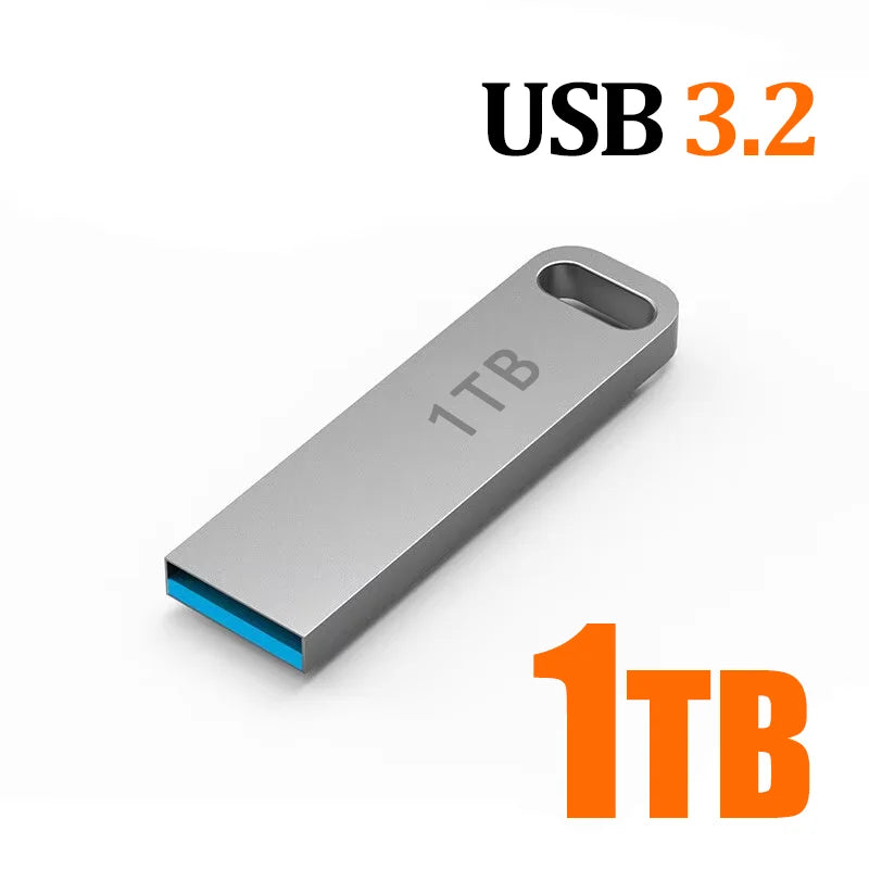 Sleek silver portable USB 3.2 flash drive with a keyring loop and blue interior connector detail.