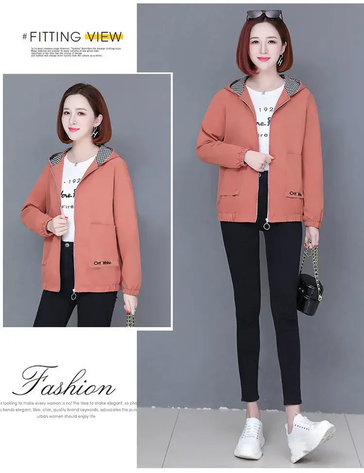 Women’s coral zip-up hooded jacket with a black and white gingham lining, front pockets, and elasticated cuffs.