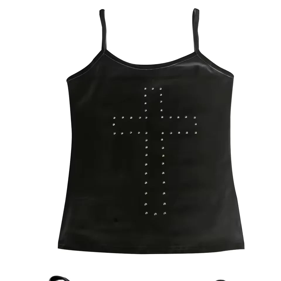 Black camisole top with thin straps and a central cross design made of silver-tone studs.
