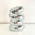 Silver disco ball flower vase with a quirky, stacked, wobbly organic shape covered in reflective mirror tiles.