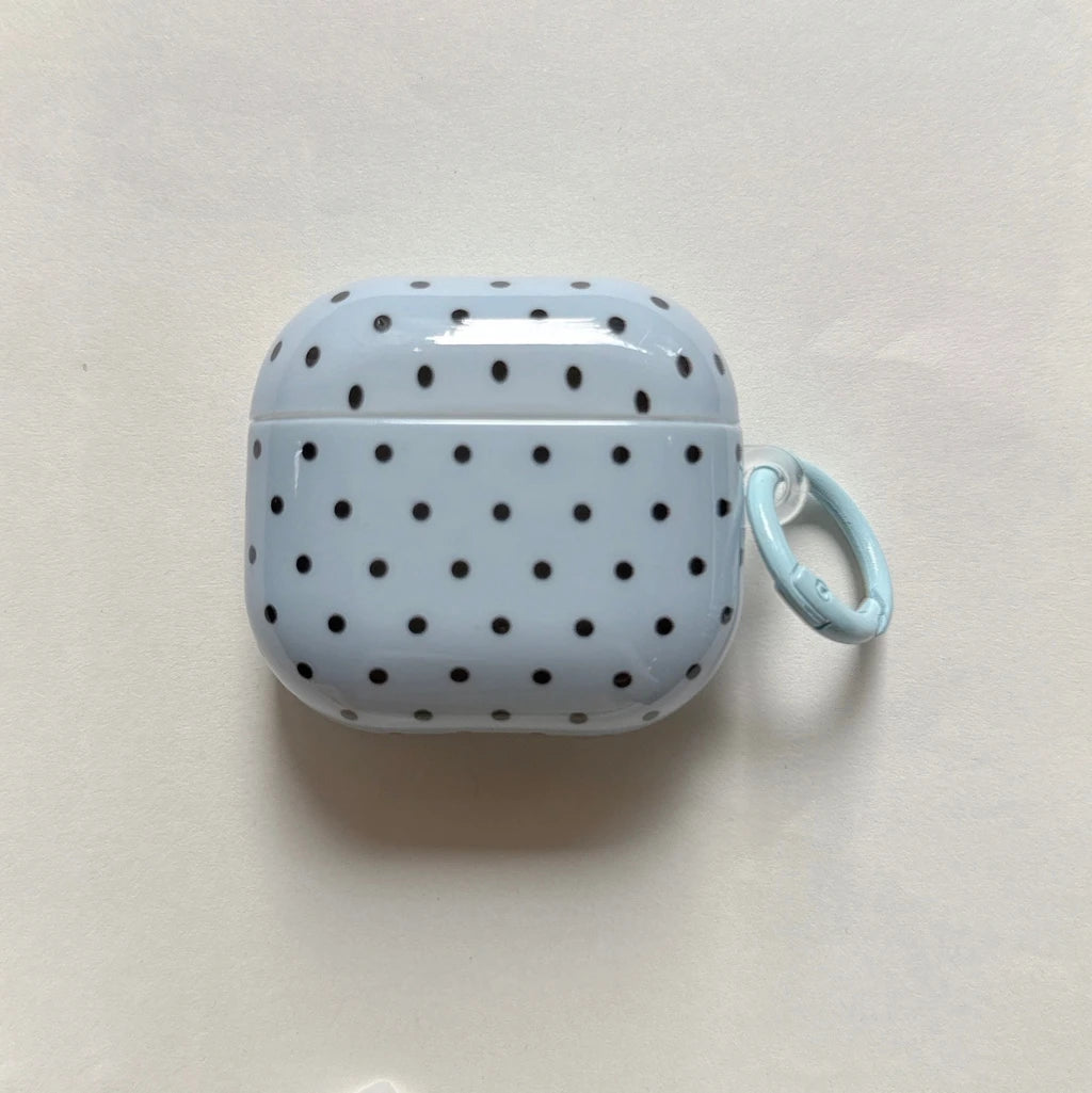 Glossy pale blue polka dot AirPods case with a matching carabiner. Compatible with AirPods.