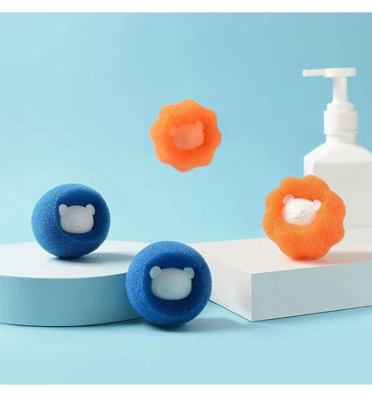 Blue and orange bear-shaped cleaning sponges on display with a white pump bottle.