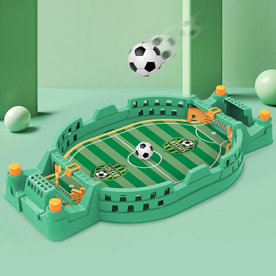 Tabletop football game in green with yellow control knobs, a striped pitch, two goals, and miniature soccer balls.