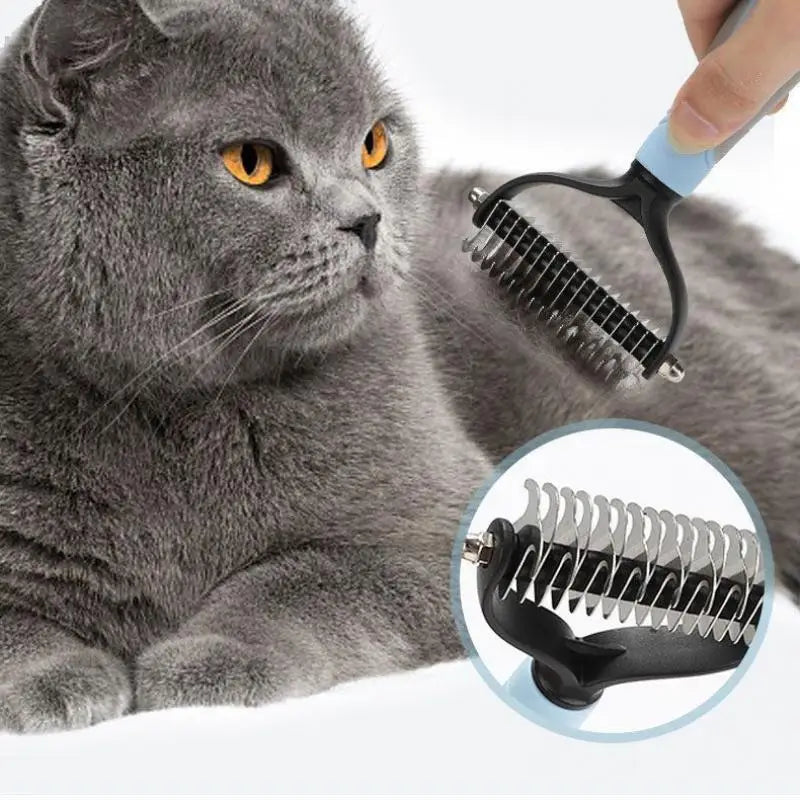 A hand uses a blue and black pet grooming rake to brush a fluffy grey cat, with a close-up of the metal blades.