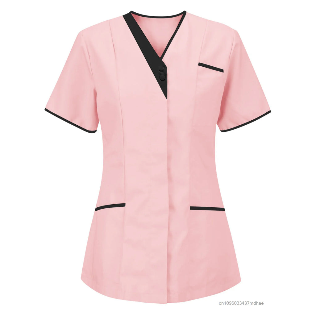 Pink women's work tunic with a black V-neck trim, button detail, short sleeves and two front pockets.