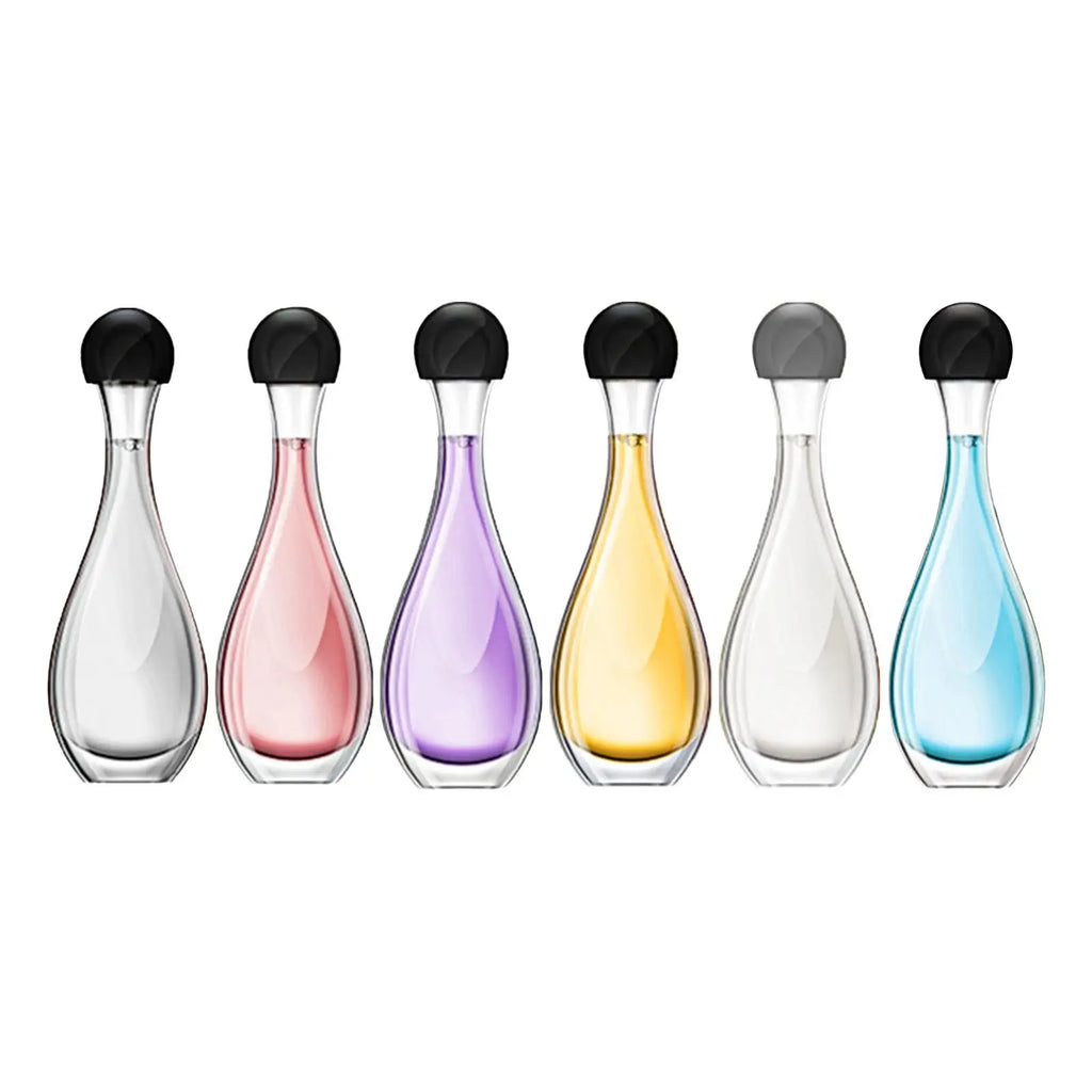 Six glass perfume bottles in a teardrop shape with round black caps, filled with various coloured liquid fragrances.