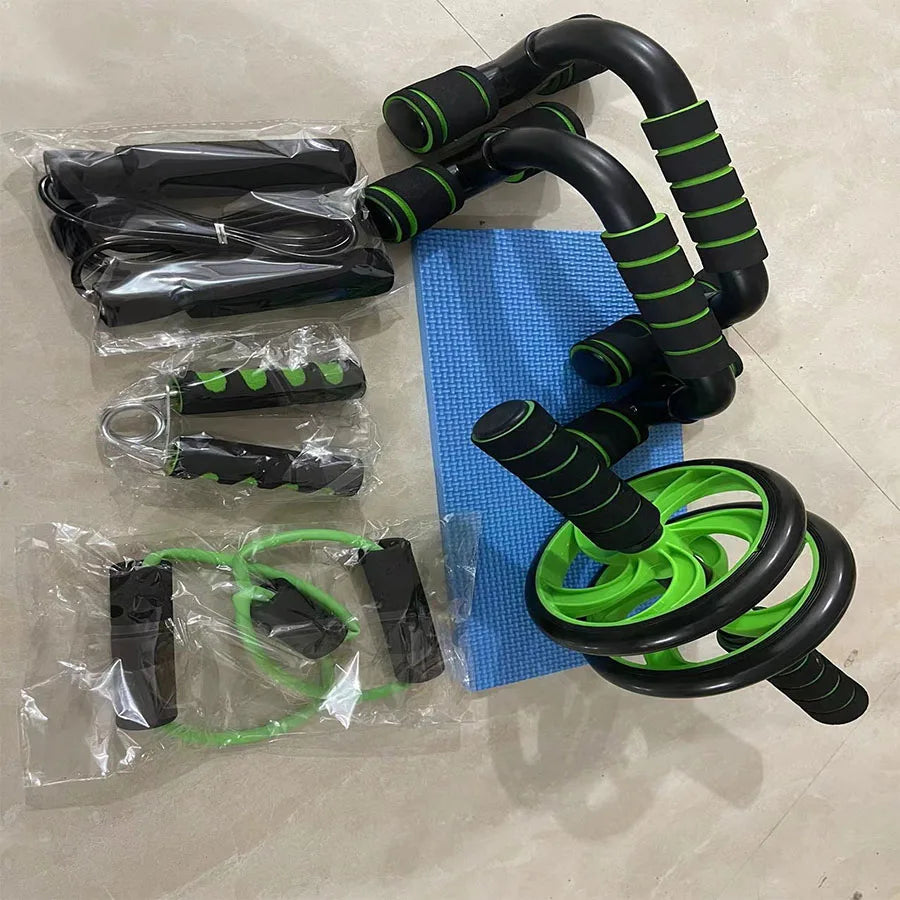 7-piece home fitness set featuring black and green exercise equipment, including a roller, handles, and a blue mat.