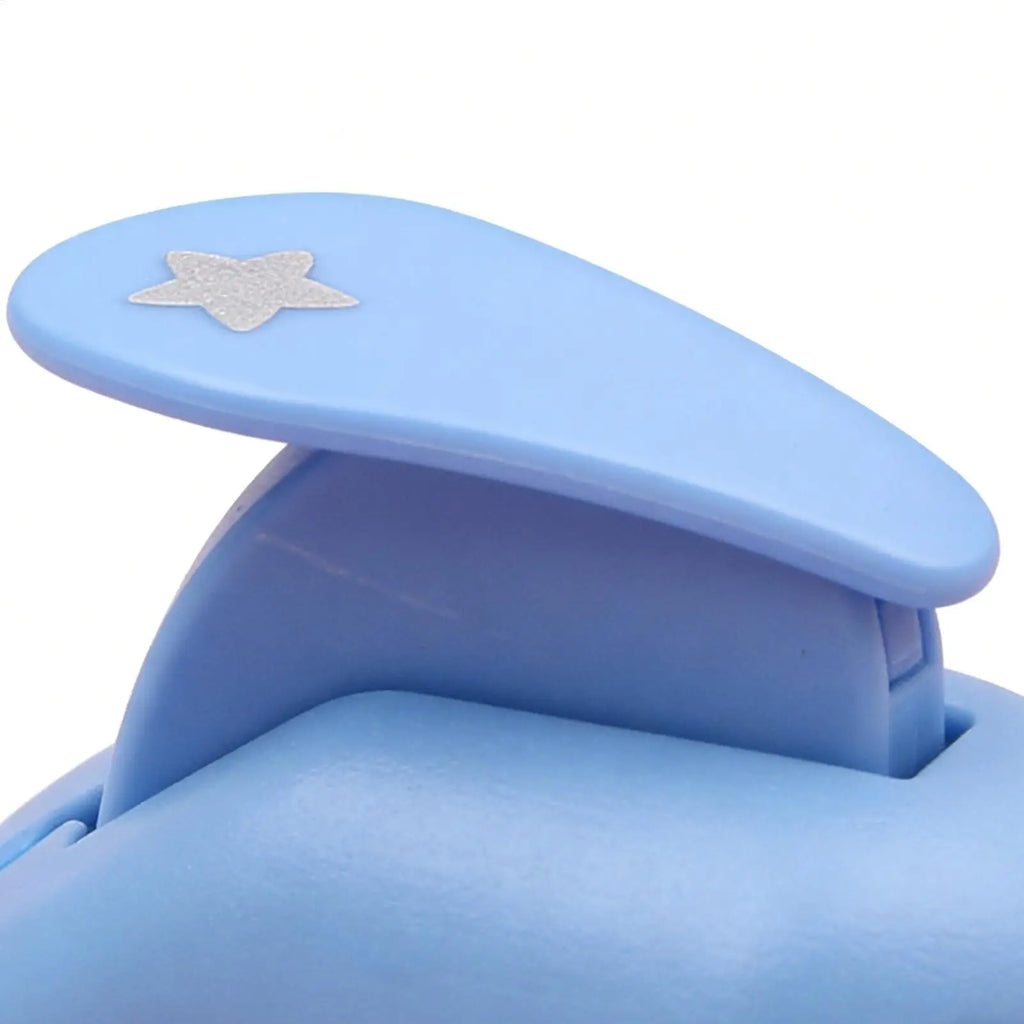 Light blue craft puncher featuring a silver star icon on the handle, isolated on a white background.