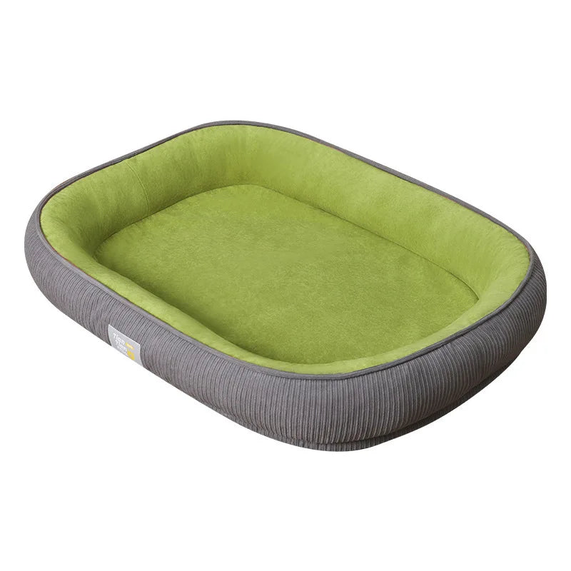 Rectangular green and grey pet bed with raised plush walls and a ribbed exterior.