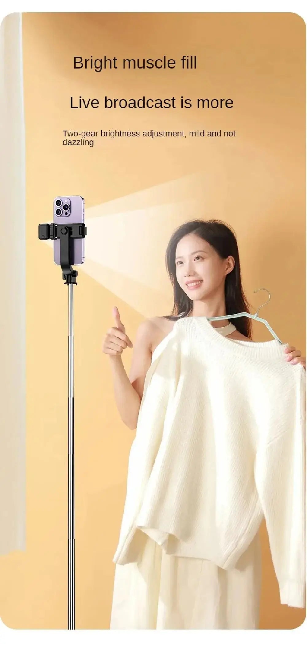 Extendable selfie stick with adjustable brightness fill light holding a smartphone for live streaming.